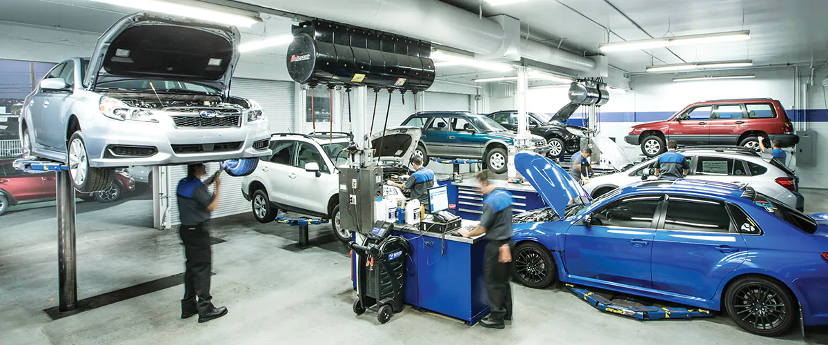 Picture of Subaru Service bays with Subarus having maintenance performed.